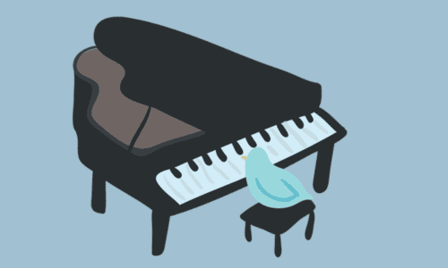グランドピアノの椅子にとまる小鳥