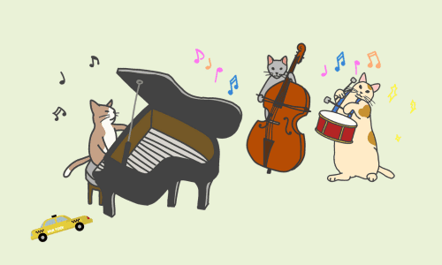 猫のピアノ・トリオ
そばにイエローキャブのおもちゃ