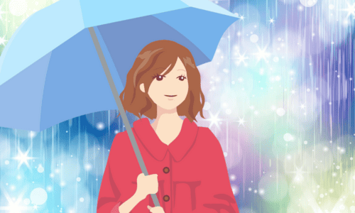 雨の中に傘を持って佇む赤いレインコートの女性