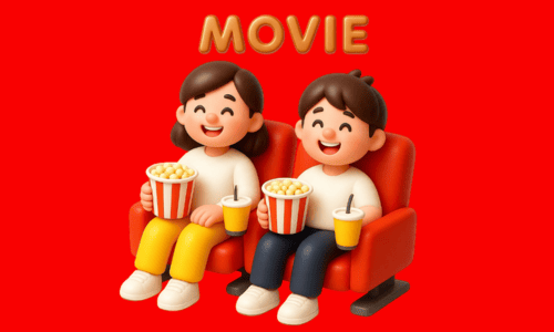 映画館の座席でポップコーンのカップとドリンクのカップを持つ女の子と男の子